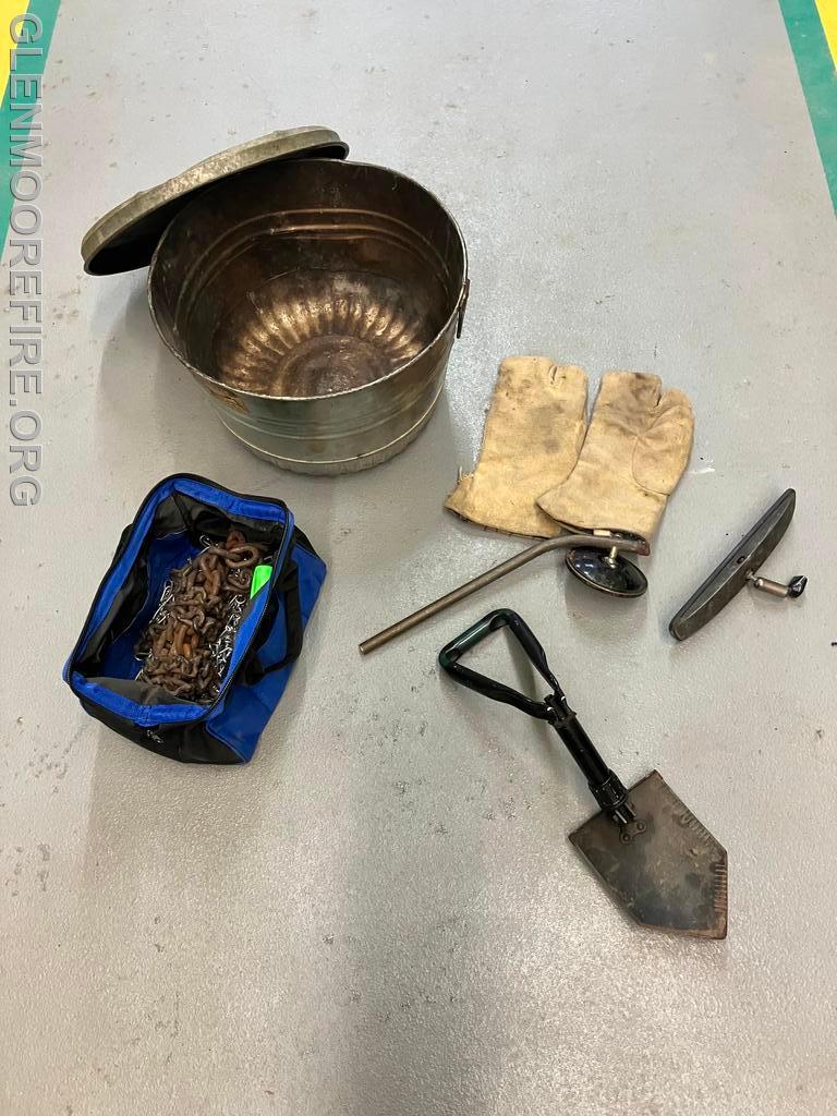 Different tools for cleaning out the fire box.